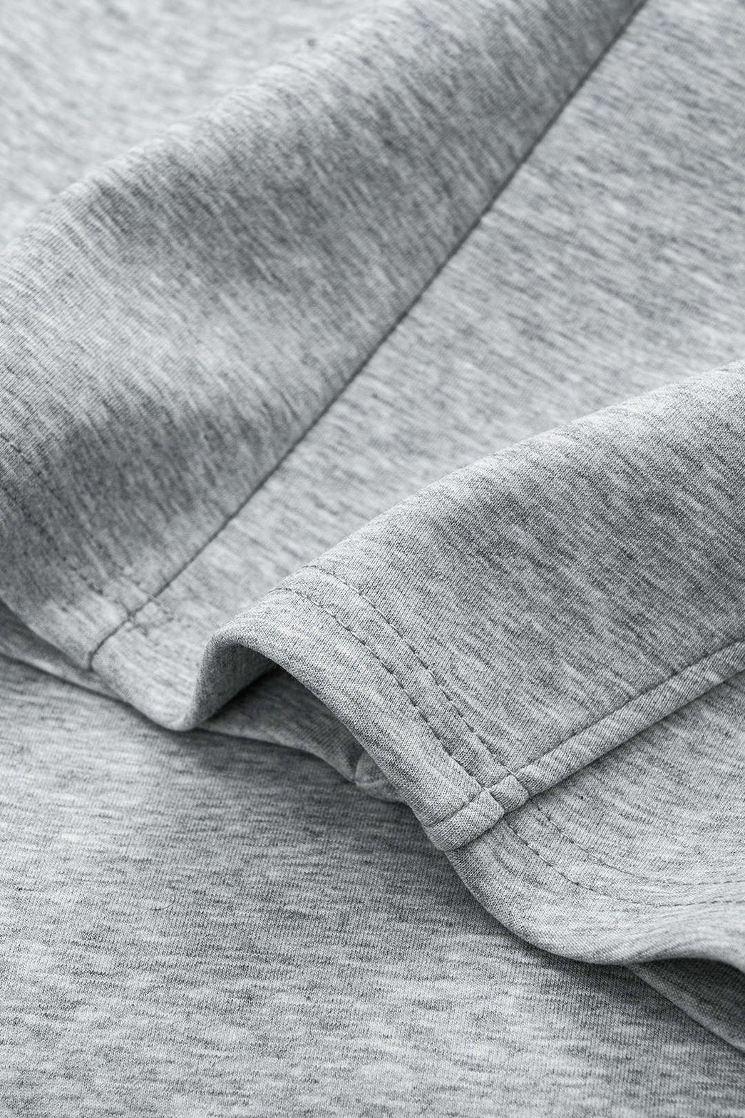 Pantalon large plissé gris vue complète élégance
