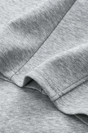 Pantalon large plissé gris vue complète élégance