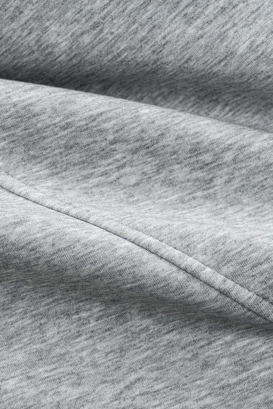 Pantalon large plissé gris détail poche liberté