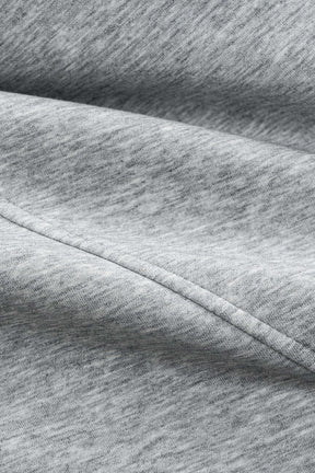 Pantalon large plissé gris détail poche liberté