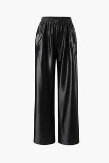 Pantalon large en satin vert vue de côté - Emeraude