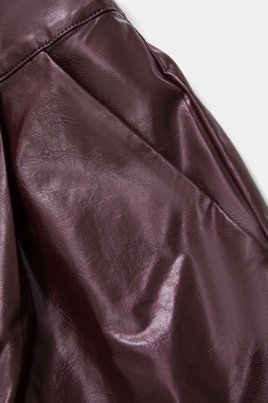 Pantalon similicuir bordeaux détail poche étoile