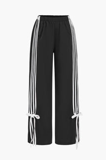 Pantalon sport bordeaux vue complète fleur