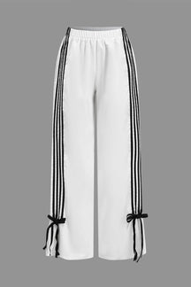 Pantalon sport bordeaux détail bande pluie