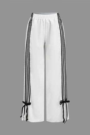 Pantalon sport bordeaux détail bande pluie