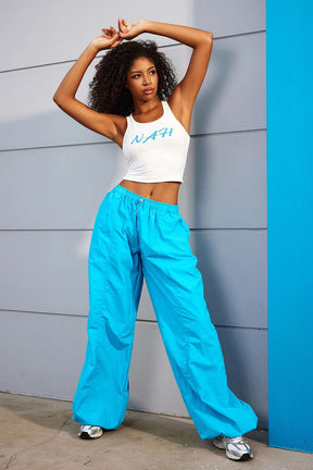 Pantalon large sportswear bleu turquoise soleil