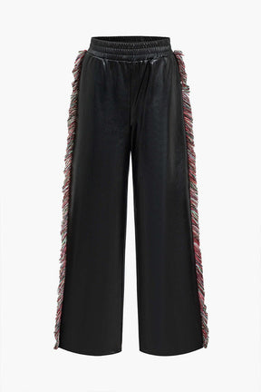 Pantalon noir en simili cuir à franges latérales étoile