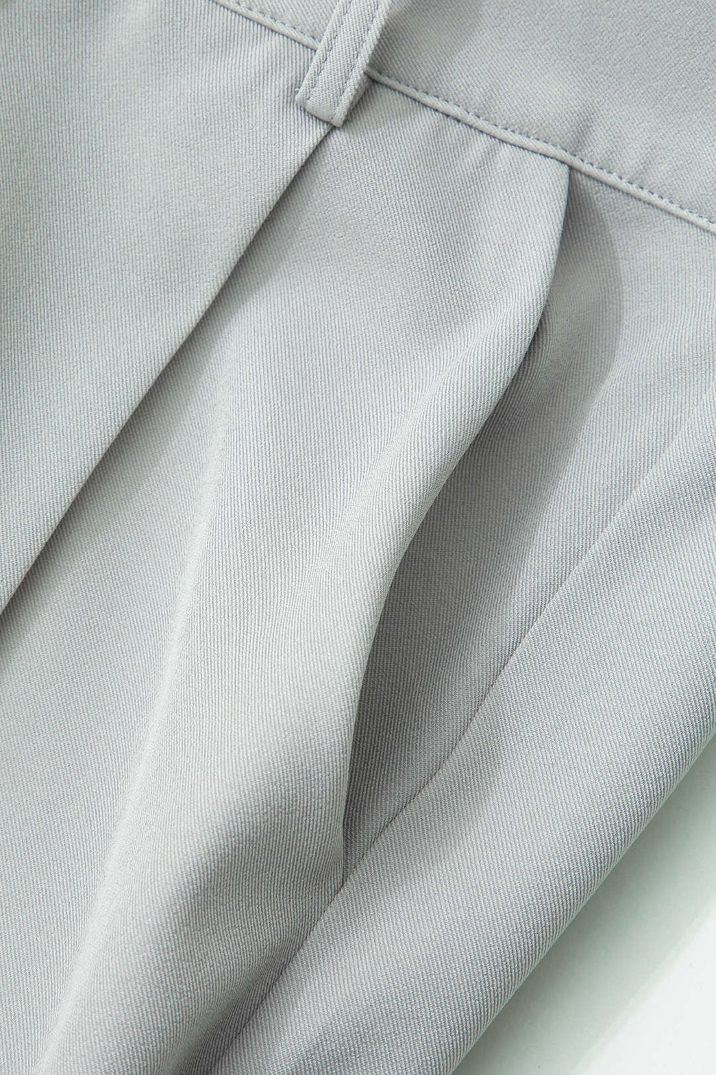 Pantalon taille haute détail légèreté