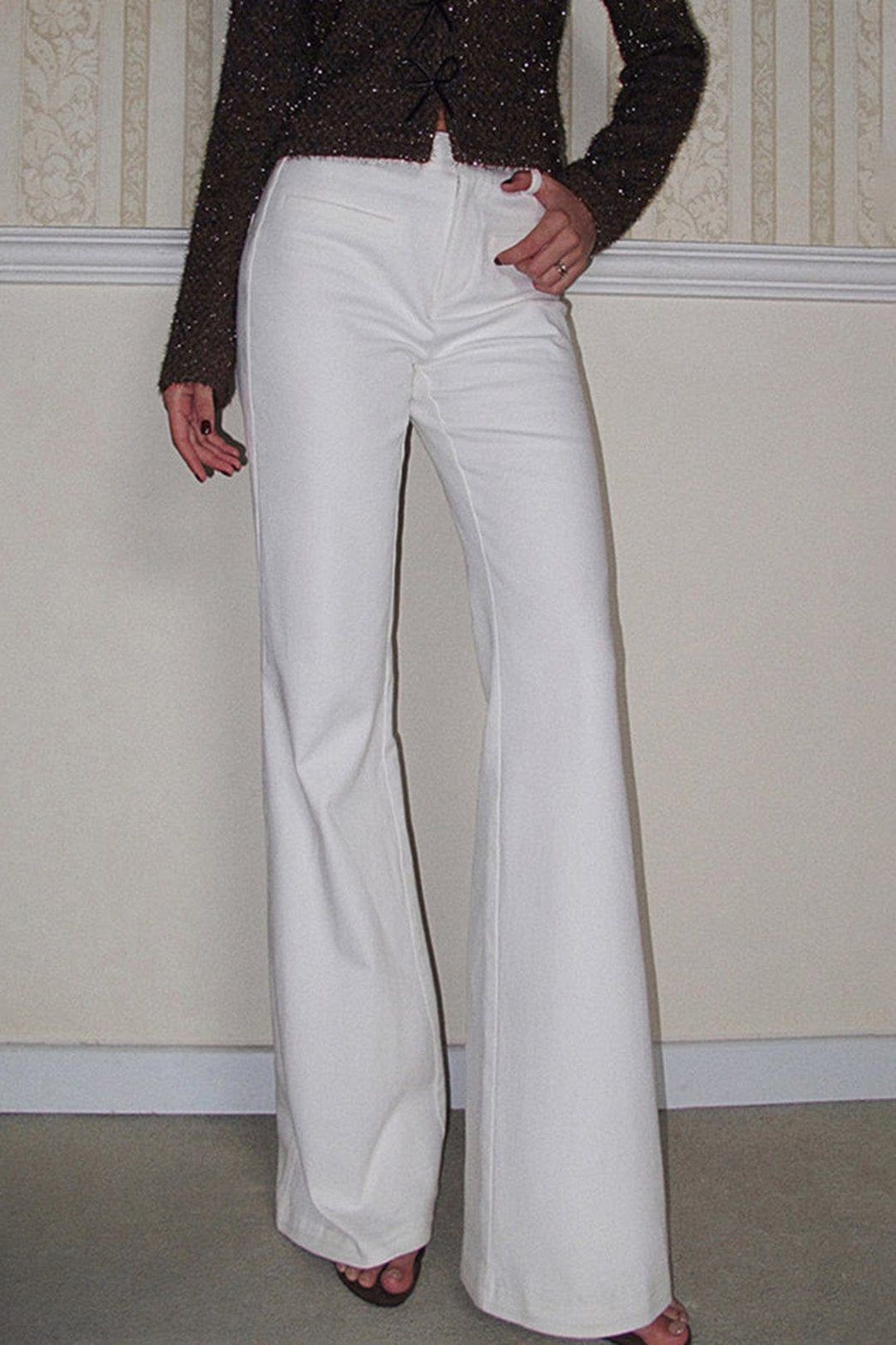Pantalon blanc taille haute coupe large élégant soleil