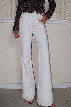 Pantalon blanc taille haute coupe large élégant soleil