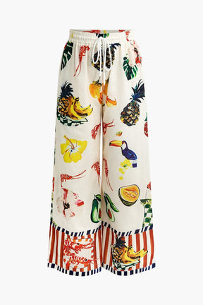 Pantalon large imprimé exotique brise