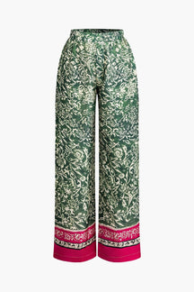 Pantalon palazzo vert à motifs floraux soleil