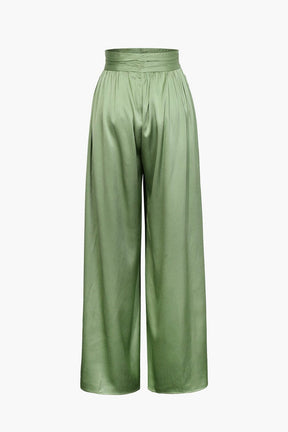 Détail taille haute pantalon satin - raffinement