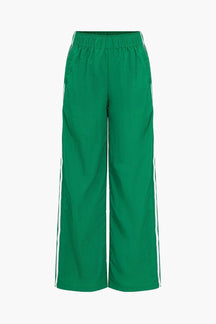 Pantalon sport vert avec bandes latérales élégant