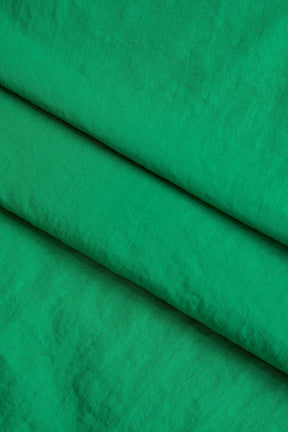 Pantalon large vert à bandes sportif