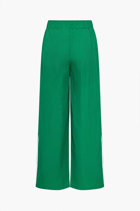 Pantalon vert décontracté style athleisure dynamique
