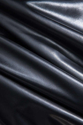 Pantalon bimatière noir et beige détail taille vent