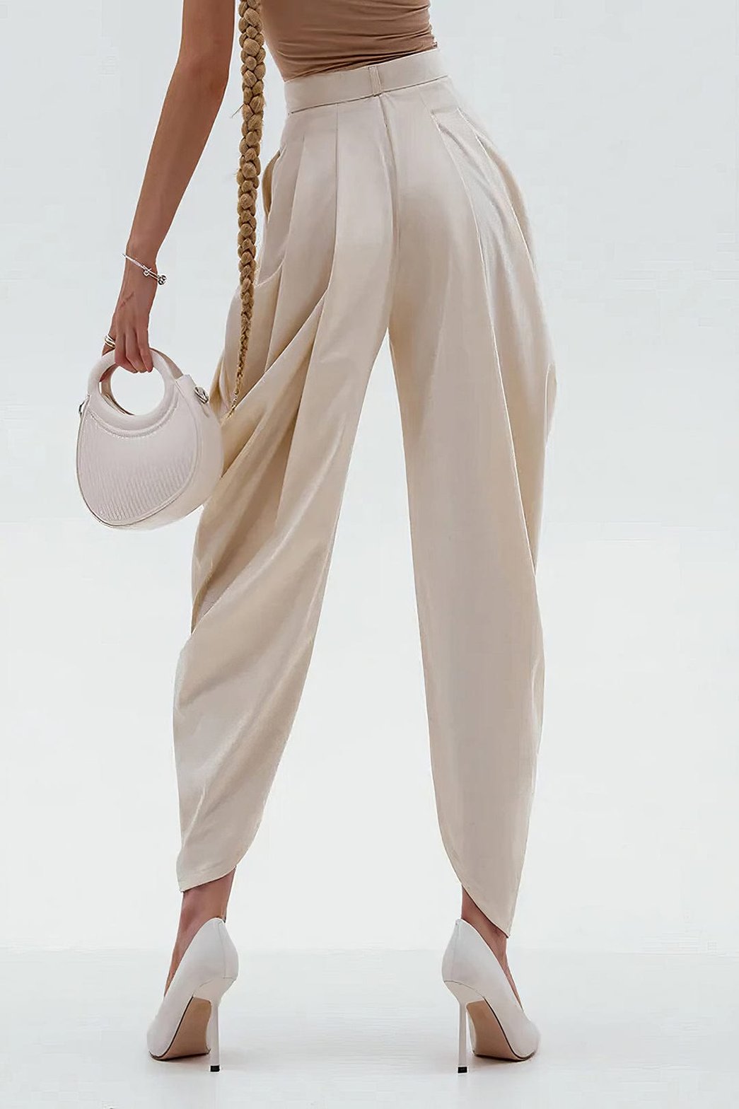 Pantalon plissé élégant crème soie