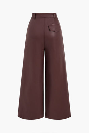 Pantalon ample en simili cuir vue de côté soleil