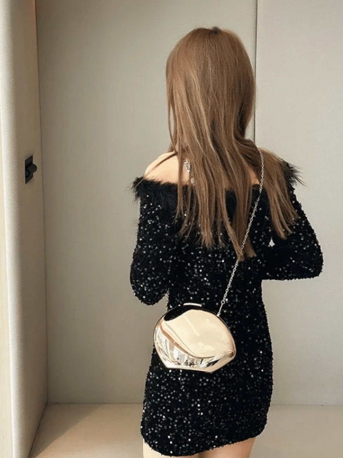 Pochette luxe dorée vue de côté étoile
