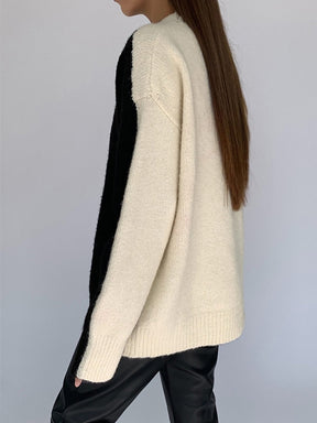 Pull noir détail manche rayure légèreté