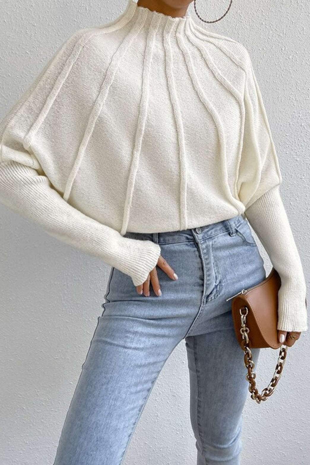 Pull blanc tendance grâce