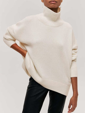 Pull col roulé détail maille légèreté