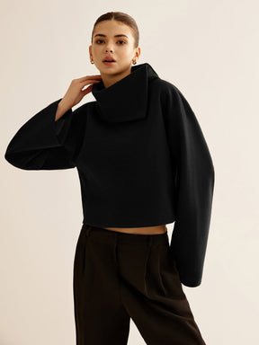 Pull tweed col roulé chic