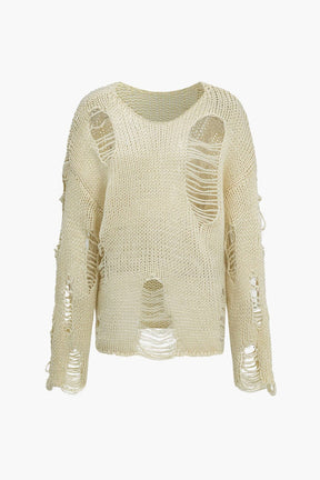 Pull maille déstructuré beige effet usé douceur