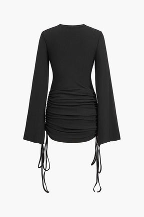 Robe côtelée noire froncée vue de dos lune