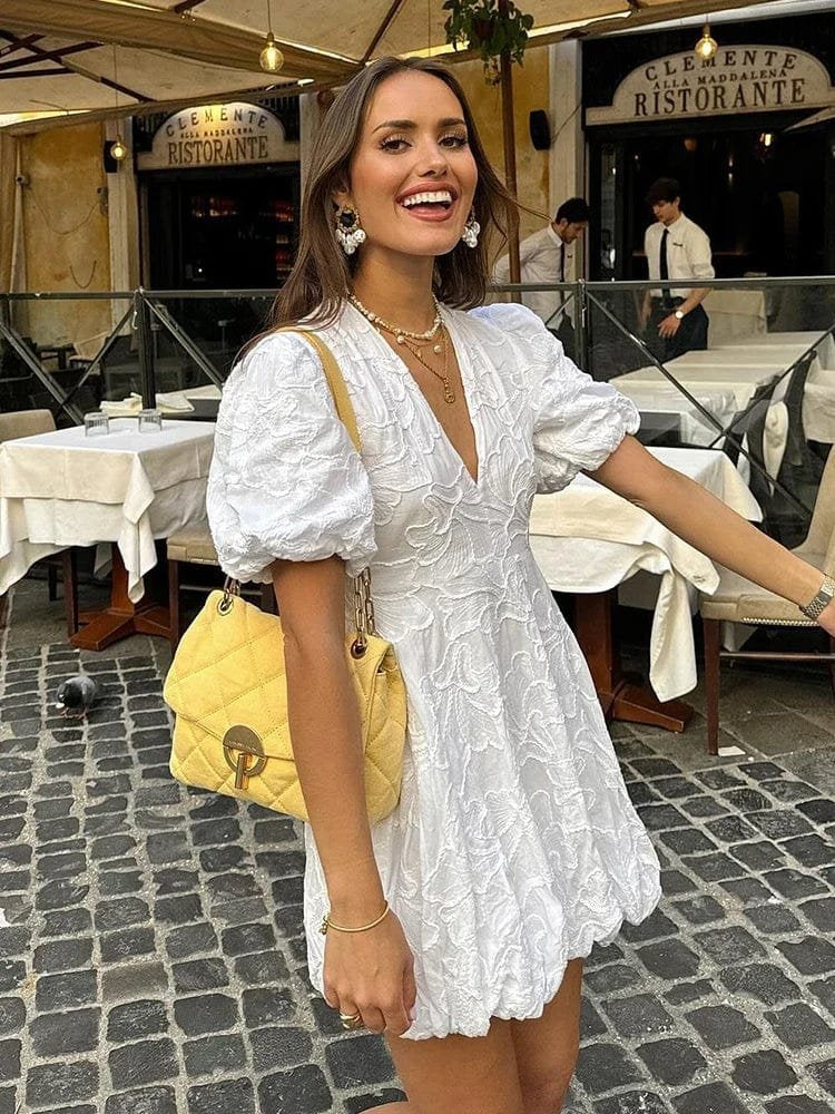 Robe brodée détail des manches bouffantes rose
