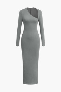 Robe longue asymétrique noire vue complète arbre