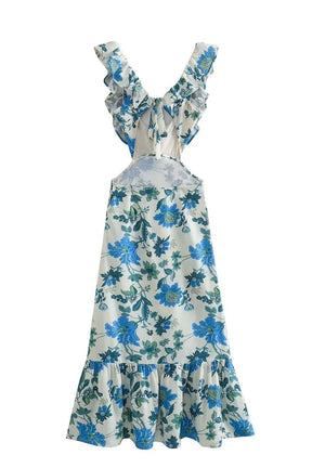 Robe longue bleue vue côté vague