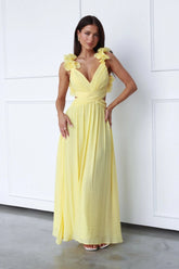 Robe longue jaune décolletée papillon
