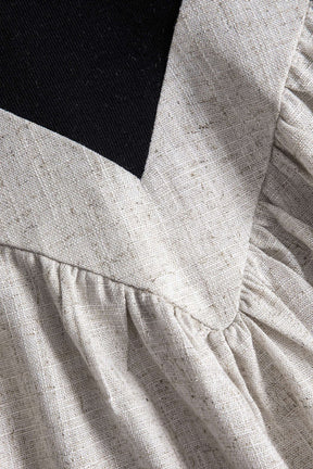 Robe longue lin plissée vue de côté fleur