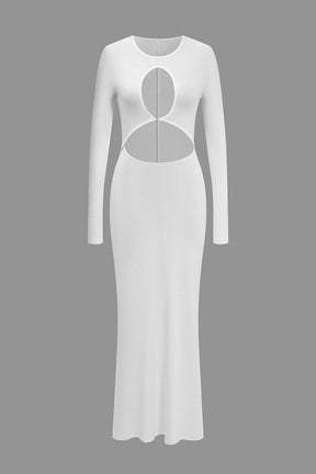 Robe longue moulante blanche découpes étoile