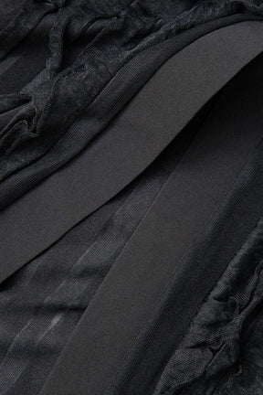Robe longue noire vue de dos nuage