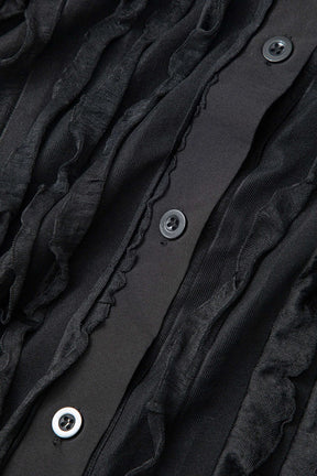 Robe longue noire détail manche pluie