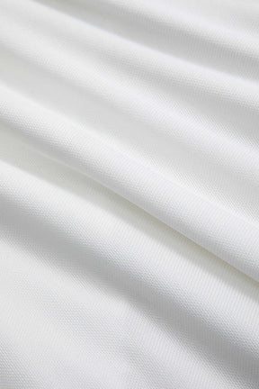 Robe longue blanche moulante détail des fronces lune