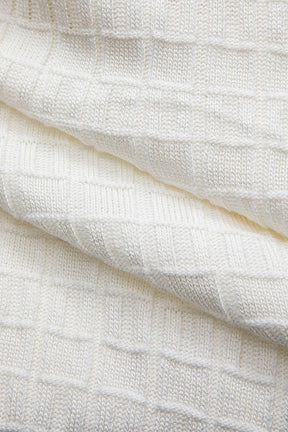 Détail maille robe tricot blanche - Raffinement