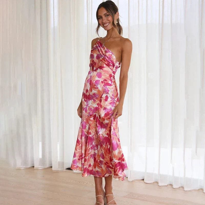 Robe asymétrique fleurie rose vue de côté soleil