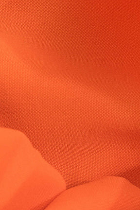 Détail volants robe orange lune