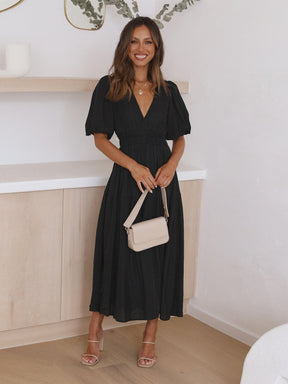 Robe féminine à manches bouffantes grâce