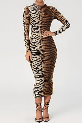 Robe midi léopard moulante détail tissu nuage