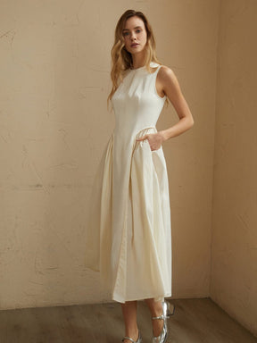 Robe midi plissée détail de la coupe rêve