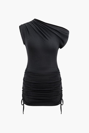 Robe asymétrique noire détail nœud élégante
