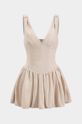 Robe mini plissée en lin beige vue de face soleil