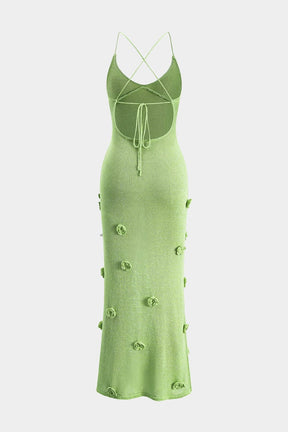 Vue dos nu de la robe verte à fleurs - Élégance