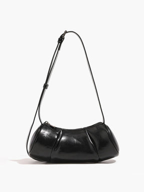 Sac cylindrique noir en cuir synthétique élégant soleil