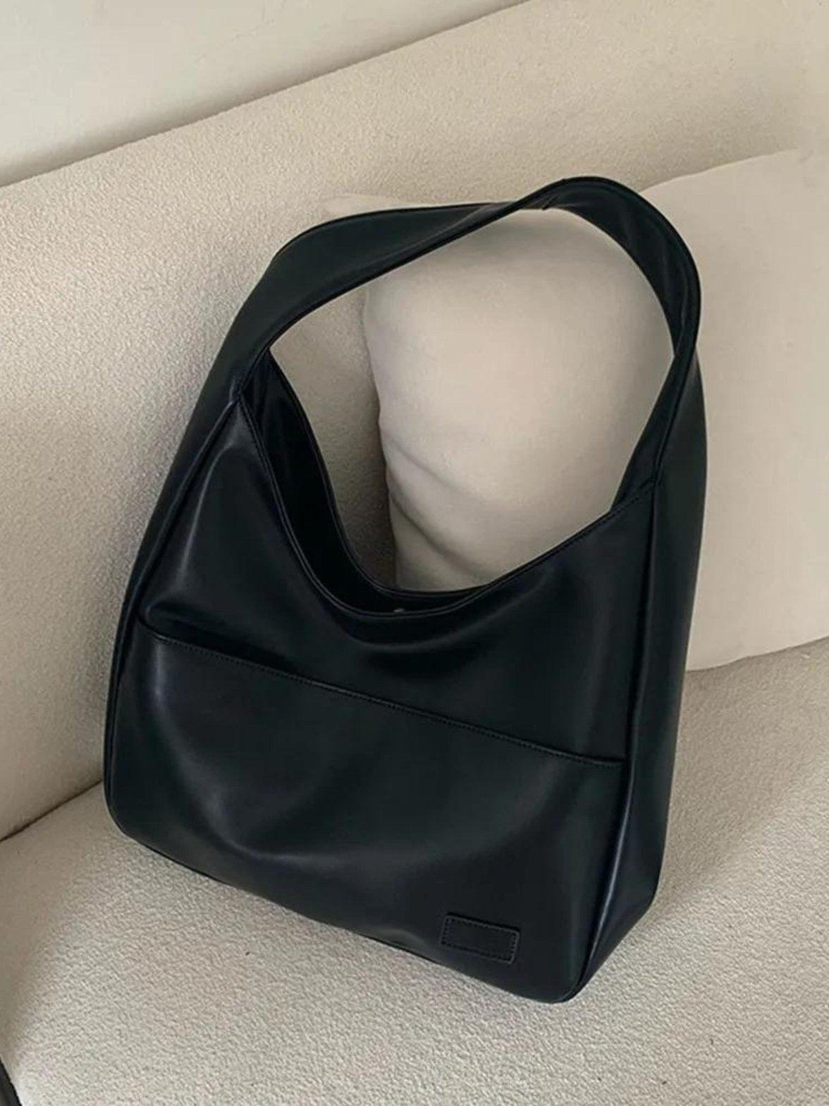 Sac porté à l'épaule pluie